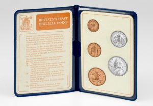 Britains first decimal coins blue pack inside 300x208 - Britain's First Decimal Coins