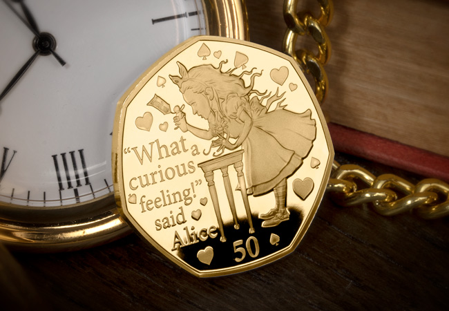 LS 2021 IOM Alice in wonderland gold proof with colour print lifestyle - Fall down the rabbit hole and discover the BRAND NEW Alice’s Adventures in Wonderland 50ps…